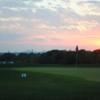 A sunset view of a hole at City View Golf Center.