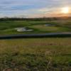 A sunset view of a hole at Shaker Run Golf Club.