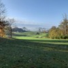 A fall day view of a fairway at Aston Oaks Golf Club.
