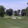 A view of the 8th green protected by sand traps at Mercer County Elks Country Club