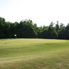 A sunny view of a green at Oaktree Golf Club
