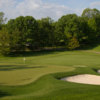 A view of a hole protected by sand traps at Springfield Country Club.