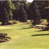 A view of fairway and green with water on the left side at Leisure Time Recreation