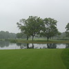 A view of a green with water coming into play at Toledo Country Club