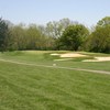 A view of green protected by sand traps at Cassel Hills Golf Course
