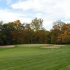 A view of green guarded by sand traps at Zanesville Country Club