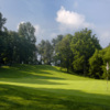 A sunny day view of a hole at Oxbow Golf & Country Club