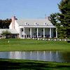 A view of the clubhouse surrounded by water from Tam O'Shanter Golf Course - Dales