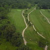 Aerial view of greens and faiways at Deer Pass Golf Course