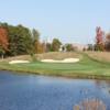 A view of a hole with water and bunkers coming into play at Wedgewood Golf & Country Club