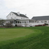 A view of the clubhouse and putting green at Snow Hill Country Club