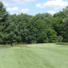 A view of a green protected by bunkers at Raccoon Valley Golf Course