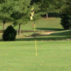 A sunny day view of a hole at Meigs County Golf Course