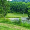 A view over the water of a hole at Whiskey Run Golf Course & Lodge