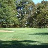 A view of green with bunkers on sides at Auglaize Country Club