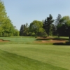 View of a bunkered green at Champions Golf Course