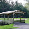A view of green with bridge in foreground at Brookside Golf Course