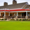 A view of the clubhouse and practice putting green at Quail Hollow Country Club.