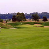 A view of green #14 surrounded by bunkers at Cooks Creek Golf Club