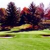 A view of green protected by bunkers at Pine Hill Golf Course