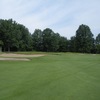 A view of the 4th green protected by bunkers at The Golf Club