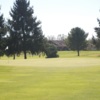 A sunny day view of a green at Carroll Meadows Golf Course.