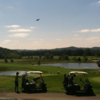 A sunny day view from Oak Shadows Golf Club.