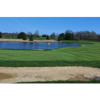 The seventh hole at Winding Hollow wraps around a pond. 